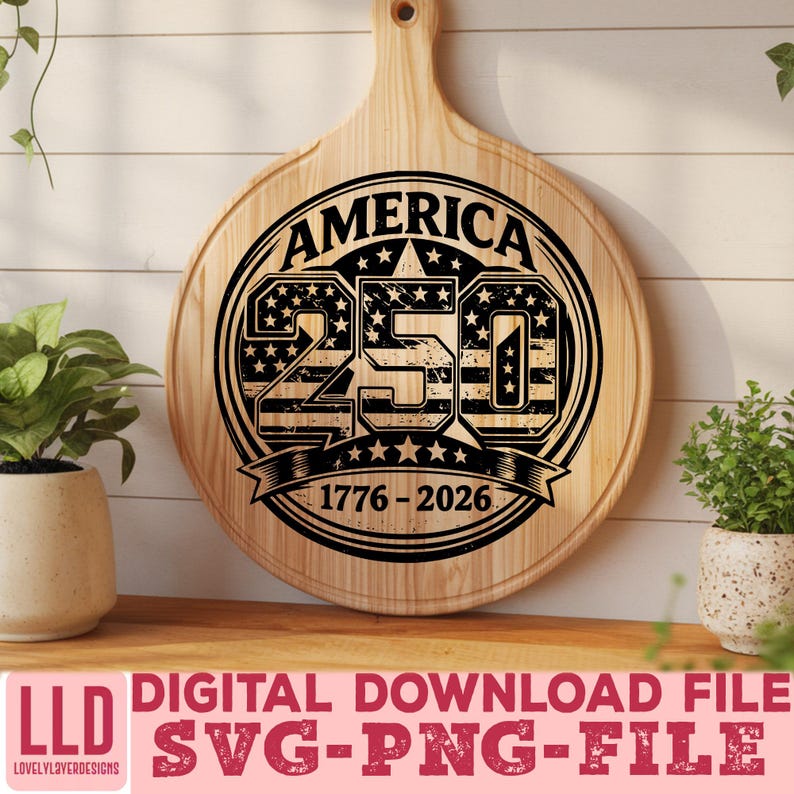May include: A round wooden cutting board with a handle, featuring a black graphic design commemorating America's 250th anniversary. The design includes the word "AMERICA" above the number "250" with stars and stripes, and the years "1776-2026" below. The words "DIGITAL DOWNLOAD FILE SVG-PNG-FILE" are at the bottom.