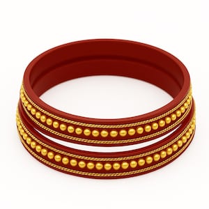 May include: Two circular red bangles featuring a central row of small gold-coloured spheres flanked by two thin, twisted gold-coloured rope-like bands. The bracelets have a smooth, matte red finish and a consistent, uniform thickness throughout the design.
