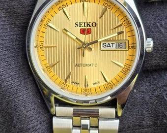 Vintage Seiko 5 automatisch heren staal dag datum 17 juwelen gerenoveerd Japans polshorloge