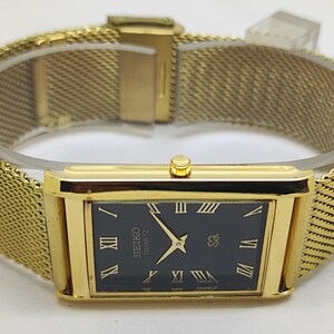 vintage Seiko Quartz Tank Slim unisexe Rectangle Montre-bracelet japonaise remise à neuf cadran noir image 6