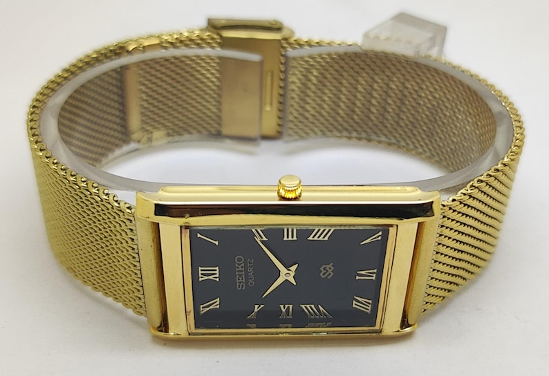 vintage Seiko Quartz Tank Slim unisexe Rectangle Montre-bracelet japonaise remise à neuf cadran noir image 6