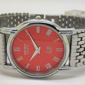 Vintage Seiko Slim Quartz Unisex Steel Refurbished Japanese Wrist watch Red Dial