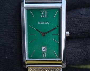 Vintage Seiko Quartz heren staal gedateerd rechthoek gerenoveerd Japans polshorloge groene wijzerplaat