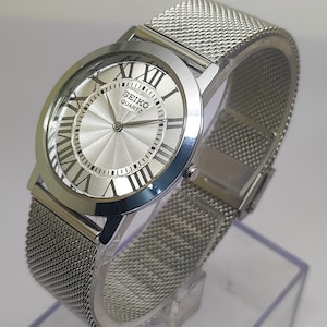 Vintage Seiko Quartz slank uniseks Romeinse cijfers wijzerplaat gerenoveerd Japans retro polshorloge