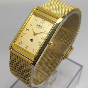 Vintage Seiko Quartz Tank Slim Unisex Rectangle Refurbished Japanese Wrist watch Gold Dial