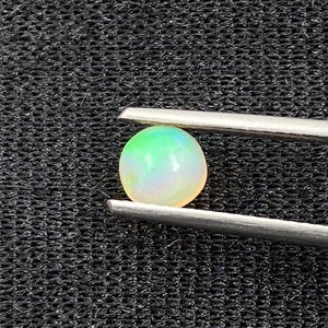 Natural Ethopian Opal, round Cabochon, 5.40x5.40x3.10 mm, 0.40 Carats
