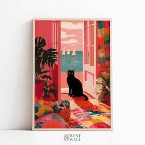 May include: A framed art print depicting a black cat sitting in an open doorway looking out at a sea with sailboats. The interior features a colorful patterned rug, a large potted plant, and vibrant pink walls. The text West & Wall is visible.