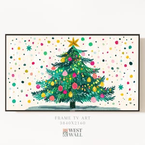 May include: A framed digital art print of a Christmas tree. The tree is green with colorful ornaments and a gold star on top. The background is off-white with colorful confetti. The text "FRAME TV ART" and "WEST & WALL" are visible.