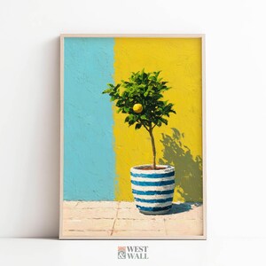 May include: A framed art print featuring a potted lemon tree with a single ripe lemon. The tree is in a blue and white striped pot, set against a vibrant yellow and blue background. The artwork has a textured, painted appearance.