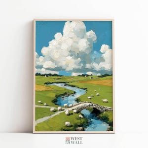 Puede incluir: Una pintura de paisaje enmarcada representa una escena rural serena. Un río serpentea a través de campos verdes salpicados de ovejas, bajo un cielo azul brillante lleno de nubes blancas y esponjosas. Un puente de piedra cruza el río. La obra de arte está firmada "WEST & WALL".