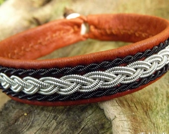 Nordic MJOLNIR Sami bracelet. Swedish Lapland reindeer leather with pewter and black copper braids