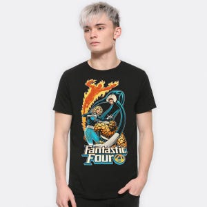 May include: Black t-shirt with a comic book graphic of the Fantastic Four. The design shows the Human Torch in flames, the Invisible Woman, the Thing, and Mr. Fantastic. The words "Fantastic Four" are printed in a stylized font.