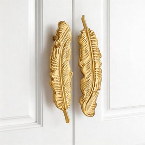 Maniglia per mobile in ottone a forma di piuma, maniglia per cassetto creativa color oro e argento
