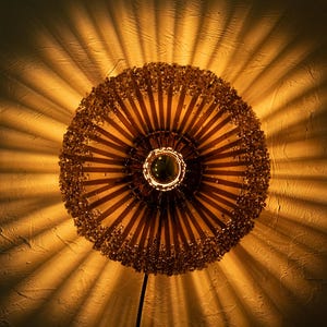 Sunburst Glass Wall Sconce – Amber & Lavender. Brass Base.
