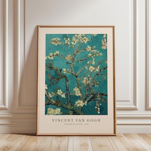 Può includere: Stampa incorniciata del dipinto "Fioritura di mandorlo" di Vincent van Gogh. L'opera presenta uno sfondo verde acqua con un mandorlo in fiore. La stampa è in una cornice di legno e include il nome dell'artista e il titolo.