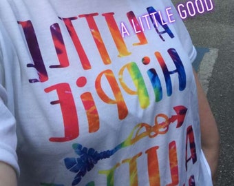 Tye Dye Sublimation design featuring A little Hippie, A little Hood (includes Peace Signs) saying on an American Apparel White tee!