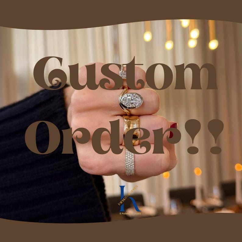May include: A hand adorned with multiple rings, including a diamond cluster and gold bands. The image features the text "Custom Order!!" in a brown, decorative font. The background is blurred, with warm lighting.