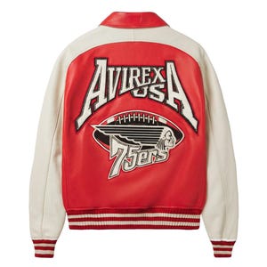 May include: A red and off-white varsity jacket featuring a large embroidered patch on the back. The patch displays the text AVIREX USA above a football graphic with a winged profile and the word 75ers. The jacket has a red collar and striped cuffs.