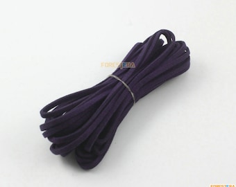 May include: A roll of dark purple suede cord, approximately 5 mm wide. The cord is coiled and ready for crafting projects.