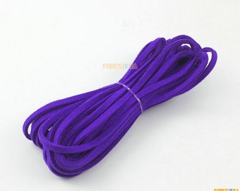 May include: A roll of purple suede cord, a type of leather cord used for crafting and jewelry making.