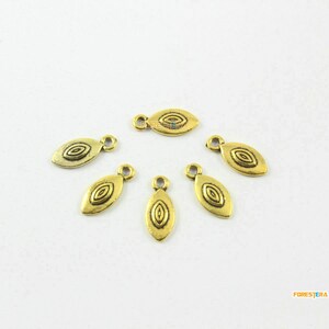 アンティークゴールドアイチャームアイペンダント 15 x 6 mm (PND1932) 100個