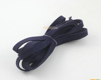 May include: A roll of dark blue suede leather cord. The cord is approximately 1/4 inch wide and is perfect for crafting projects.
