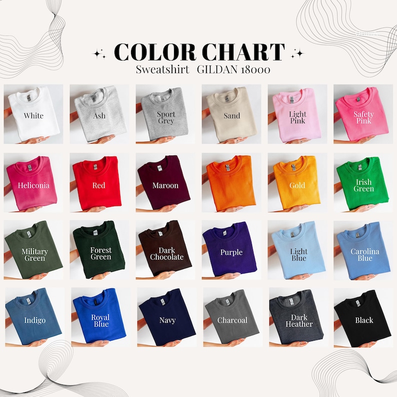 May include: Color chart of Gildan 18000 sweatshirts in various colors. The chart includes White, Ash, Sport Grey, Sand, Light Pink, Safety Pink, Heliconia, Red, Maroon, Gold, Irish Green, Military Green, Forest Green, Dark Chocolate, Purple, Light Blue, Carolina Blue, Indigo, Royal Blue, Navy, Charcoal, Dark Heather, and Black.