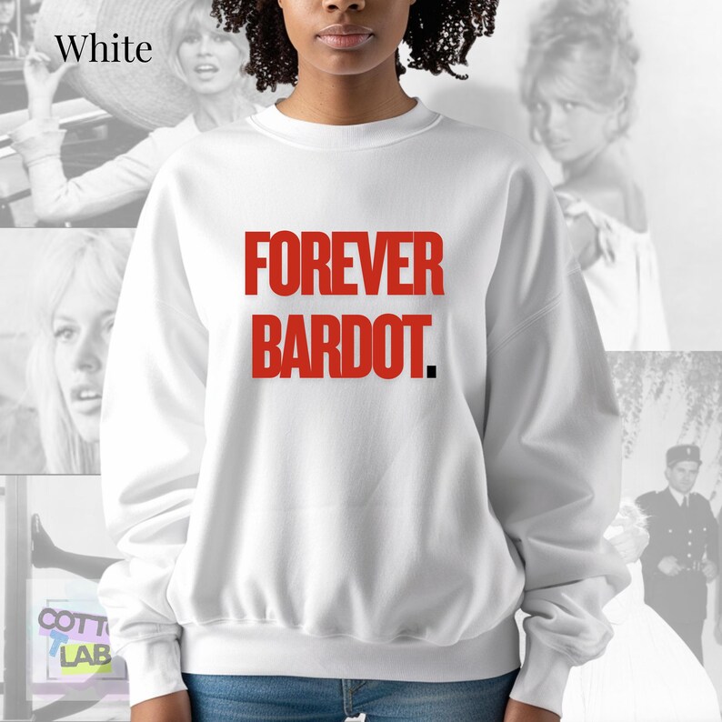 May include: White sweatshirt with the red text "FOREVER BARDOT." The long-sleeved top has a crew neck and a relaxed fit. The background features black and white images of a woman.
