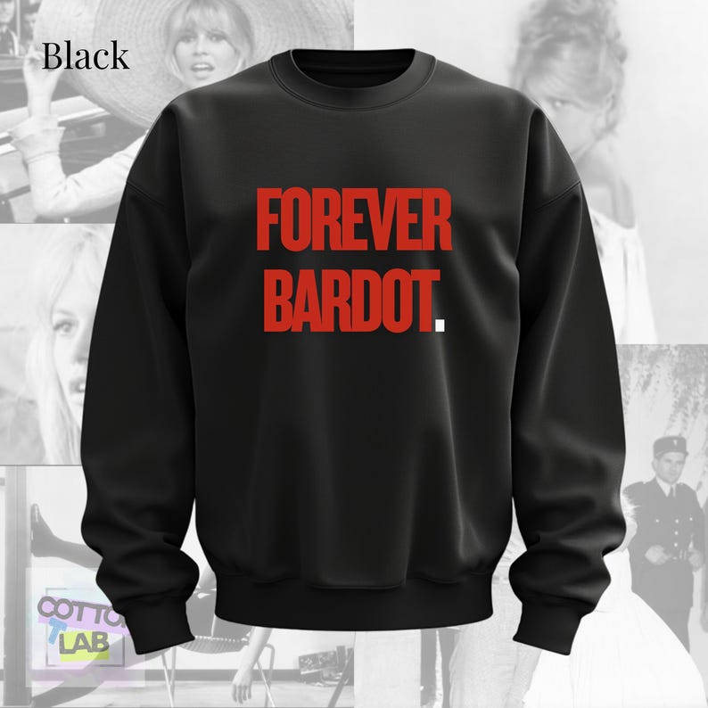 May include: Black crew neck sweatshirt with the red text "FOREVER BARDOT." The sweatshirt is a solid black color. The background features black and white images of a woman.