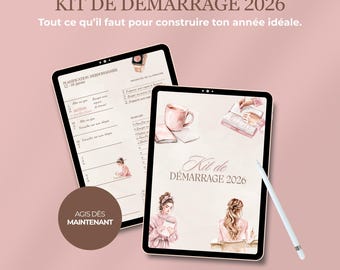 May include: Two digital tablets displaying a planner and a cover with the text "KIT DE DÉMARRAGE 2026". The tablets feature illustrations of a coffee cup, books, and a woman. A stylus is next to one tablet.