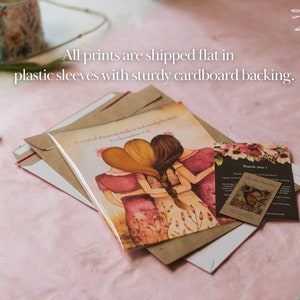 May include: A card with three friends in a huddle, with the text "A cord of three strands is not quickly broken" and "Ecclesiastes 4:12". The card is on a brown envelope with a white envelope underneath. A small thank you card with floral designs is on top of the white envelope. The text on the thank you card reads "Thank you!"