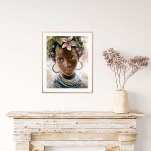 May include: A framed painting of a young woman with dark skin, wearing a flower crown and a beaded necklace. The woman has a soft expression and is looking directly at the viewer.