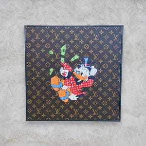 May include: Square artwork featuring a brown pattern with the letters "LV" and a cartoon image of Donald Duck and Daisy Duck throwing money. The artwork has a black border and is set against a neutral background.