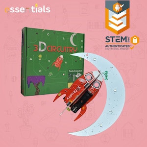 May include: A green box with the text "3D CIRCUITRY" and a red rocket ship illustration. A red and white rocket ship model is in front of a crescent moon-shaped circuit board. The image also includes the text "STEM AUTHENTICATED EDUCATIONAL PRODUCT".