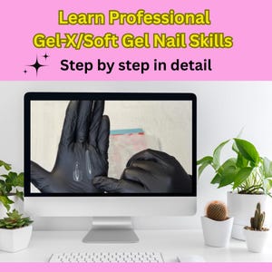 May include: A computer monitor displays a nail tutorial with the text "Learn Professional Gel-X/Soft Gel Nail Skills Step by step in detail." Black gloved hands are demonstrating the application of gel nails. The setup includes plants and a keyboard.