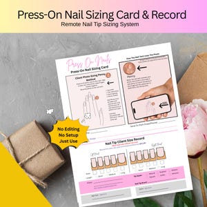 Pode incluir: Um cartão branco de dimensionamento de unhas de pressão com detalhes em rosa e texto. O cartão inclui instruções para medir os tamanhos das unhas usando uma moeda de um centavo e um registro de tamanho do cliente. O cartão está em uma superfície cinza.