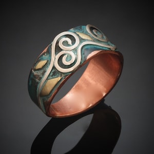 Anillo de cobre y plata, con pátina en espiral y ondas, 8 mm de ancho, hecho a mano en Columbia Británica, Canadá.