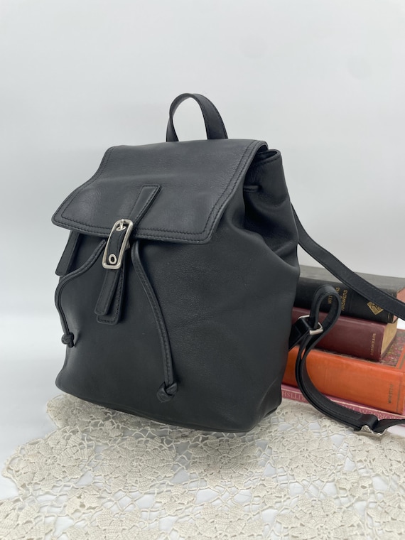 a new day mini backpack tan with gold handle Pocket Small leather goods Approximately 2 Lbs Side I got ya a Model:FBP-10 (Black/Silver)