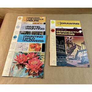 May include: A collection of five instructional art books titled The Art of Painting the Female Figure, The Art of Pastel Painting, The Art of Painting Wild Flowers, The Art of Drawing, and The Art of Perspective Drawing, featuring colorful illustrations.
