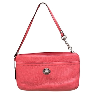 Bolso de mano Coach Legacy de piel con cierre de giro en rosa coral