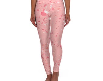 Leggings de yoga de talle alto con estampado de salpicaduras de pintura rosa.