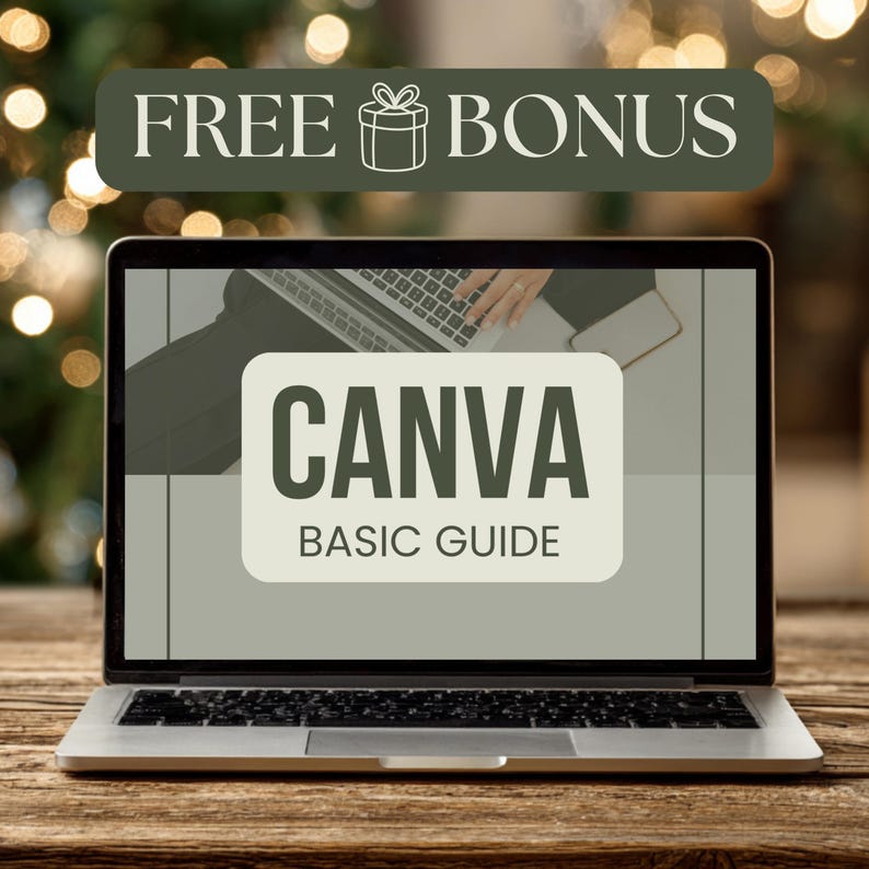 May include: A laptop displaying a Canva Basic Guide. The screen shows the word "CANVA" in large, bold letters, with "BASIC GUIDE" underneath. Above the laptop is a banner that reads "FREE BONUS". The laptop is on a wooden surface.
