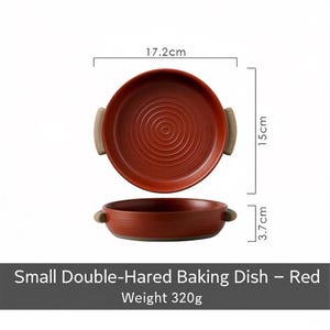 May include: A red ceramic baking dish with a circular design and two handles. The dish is 17.2 cm in diameter, 15 cm wide, and 3.7 cm deep. The weight is 320g. The text at the bottom reads "Small Double-Hared Baking Dish - Red".