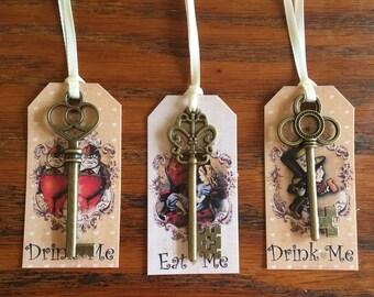 Alice in Wonderland 12 Eat Me, Drink Me party favors with bronze keys and silk ribbon