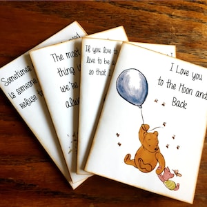 May include: Four Winnie the Pooh themed cards with different quotes. The first card says "Sometimes is someone refuse to". The second card says "The most thing is we're alw". The third card says "If you live to live to be a so that I". The fourth card has a picture of Winnie the Pooh and Piglet with a blue balloon and says "I Love you to the Moon and Back".