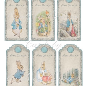 May include: Nine vintage-style gift tags featuring illustrations of Peter Rabbit in various scenes. Each tag has a blue and white border with a light blue circle at the top. The text "Peter Rabbit" is written in cursive on each tag.
