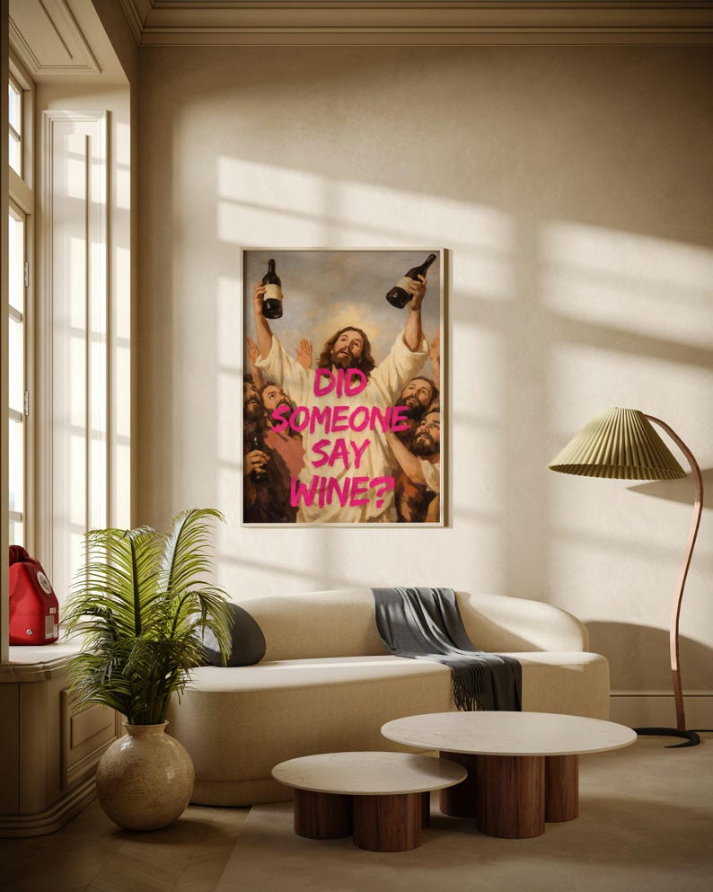 A framed funny altered art poster of Jesus holding two wine bottles with the neon pink text 'Did Someone Say Wine?', perfect for eclectic kitchen or home bar decor.