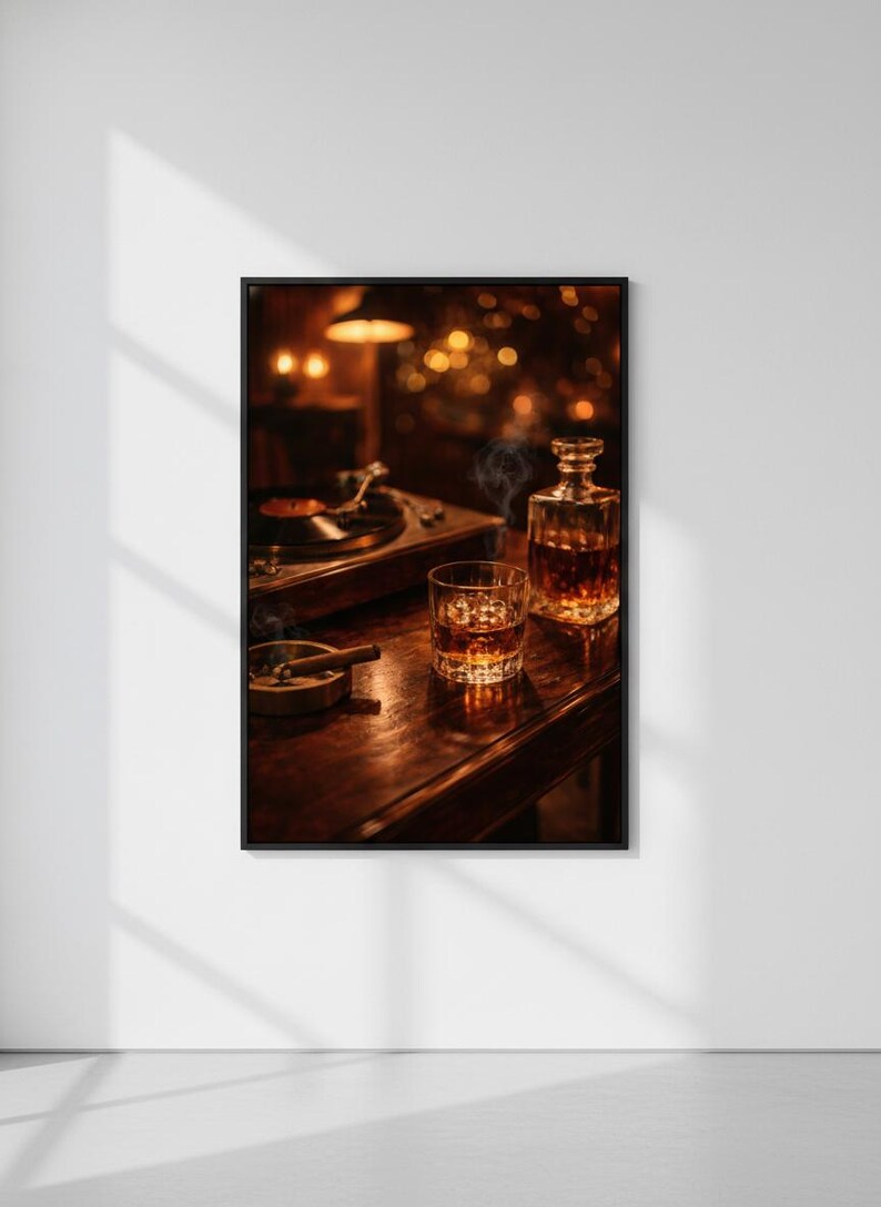 May include: A framed photograph of a dimly lit bar scene. A turntable, a glass of whiskey with ice, a decanter, and a lit cigar in an ashtray sit on a wooden bar. The background features blurred lights.