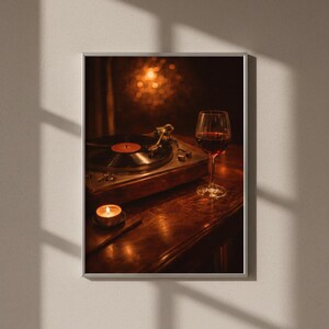 May include: Framed print showing a record player, a glass of red wine, and a lit candle on a wooden surface. The warm lighting creates a cosy atmosphere, suggesting a theme of music and relaxation.