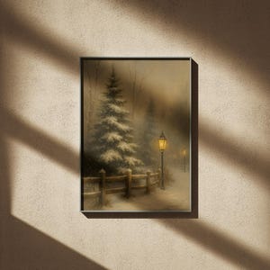 May include: Framed winter landscape art print. The artwork depicts a snow-covered path with a wooden fence, a lit lamppost, and a snow-covered evergreen tree. The scene is painted in muted tones, creating a serene and peaceful atmosphere.